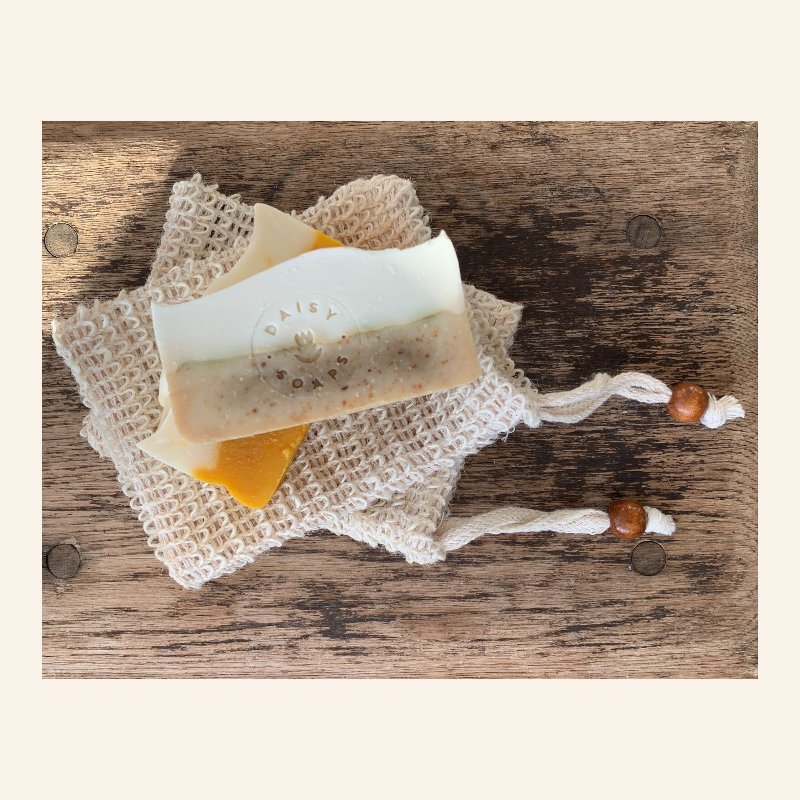 sisal soap bag with daisy soaps
